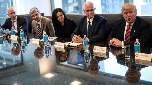 (L to R) Amazon CEO Jeff Bezos, Alphabet CEO Larry Page, Facebook COO Sheryl Sandberg, Vice President-elect Mike Pence, President-elect Donald Trump, during a meeting of technology executives at Trump Tower, Dec. 14, 2016 in New York.