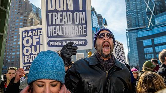 People demonstrate at Trump International Hotel and Tower in New York City, to fight against the proposed changes to the American healthcare system proposed by the Trump Administration and Republicans.