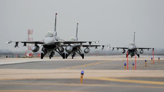 U.S. Air Force F-16 Fighting Falcon fighter jets, manufactured by Lockheed Martin Corp., taxi on the tarmac during the Max Thunder Air Exercise, a bilateral training exercise between the South Korean and U.S. Air Force, at a U.S. air base in Gunsan, South Korea, on Thursday, April 20, 2017.