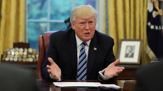 President Donald Trump speaks during an interview with Reuters in the Oval Office of the White House in Washington, U.S., April 27, 2017.