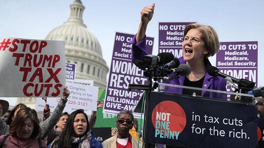 Sen. Elizabeth Warren (D-MA) addresses a rally against the Republican tax plan outside the U.S. Capitol November 1, 2017 in Washington, DC.
