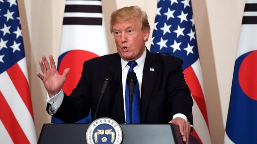President Donald Trump gestures as he speaks during a joint press conference with South Korea's President Moon Jae-in (not pictured) at the presidential Blue House in Seoul, South Korea, November 7, 2017.