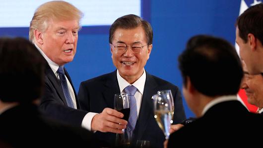 President Donald Trump shares a toast during a state dinner hosted by South Korea's President Moon Jae-in at the Blue House in Seoul, South Korea November 7, 2017.