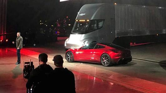 Tesla CEO Elon Musk shows off the Tesla Semi as he unveils the company's new electric semi truck during a presentation in Hawthorne, California, U.S., November 16, 2017.