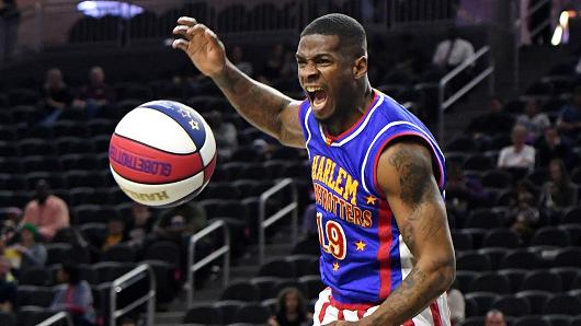 Saul 'Flip' White #19 of the Harlem Globetrotters reacts after dunking against the World All-Stars during their exhibition game at T-Mobile Arena on February 9, 2017 in Las Vegas, Nevada.