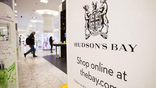 Signage is displayed inside a Hudson's Bay store in downtown Vancouver, British Columbia.