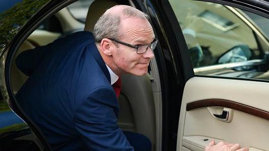 Simon Coveney, the new Irish deputy prime minister, arrives at the Mansion House in Dublin.