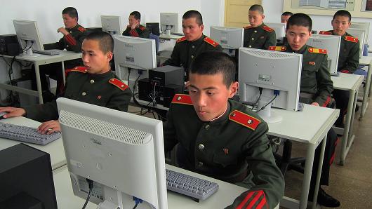 File photo of students at the Mangyongdae Revolutionary School, in Pyongyang, North Korea, work on computers.