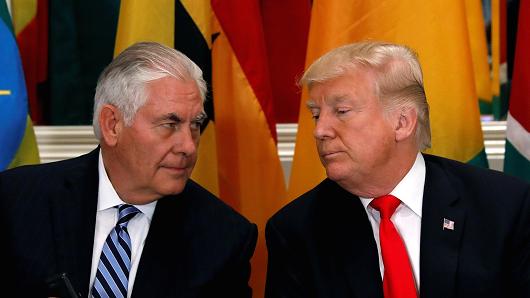 President Donald Trump and Secretary of State Rex Tillerson confer during a working lunch with African leaders during the U.N. General Assembly in New York, Sept. 20, 2017.