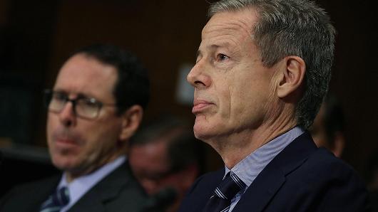 Jeffrey Bewkes, (R), CEO of Time Warner, and Randall Stephenson (L), CEO of AT&T, listen to testimony during a Senate Judiciary Subcommittee hearing on Capitol Hill, December 7, 2016 in Washington, DC. The subcommittee heard testimony regarding a proposed merger between AT&T and Time Warner.