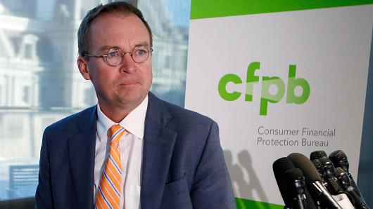 Office of Management and Budget (OMB) Director Mick Mulvaney arrives to speak to the media at the U.S. Consumer Financial Protection Bureau (CFPB), where he began work earlier in the day after being named acting director by U.S. President Donald Trump in Washington November 27, 2017.