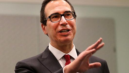 Treasury Secretary Steven Mnuchin reacts during a press conference after attending the Franchise Expo West in Los Angeles, California, November 2, 2017.