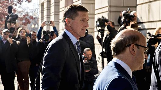 Michael Flynn, U.S. national security advisor, center, arrives at the U.S. Courthouse in Washington, D.C., U.S., on Friday, Dec. 1, 2017.