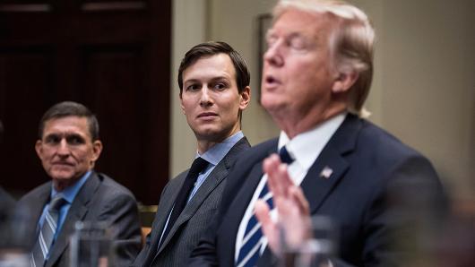 National Security Adviser Mike Flynn, and Jared Kushner, senior adviser to President Trump, listen to President Trump during a listening session with cyber security experts in the Roosevelt Room the White House in Washington, DC on Tuesday, Jan. 31, 2017.