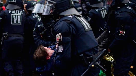 Left-wing protesters clash with police forces outside the Hannover Congress Centrum (HCC) prior to today's AfD federal congress on December 2, 2017 in Hanover, Germany. The AfD won 12.6% of the vote in German federal elections last September, making it the first right-wing party to win Bundestag seats.