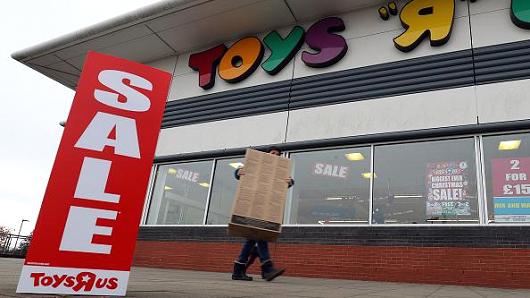 Sale signs outside a Toys R Us store in Basingstoke, Hampshire, as the company has put forward plans to close at least 26 U.K. stores, putting up to 800 jobs at risk.