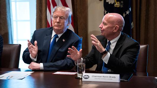 Chairman of the House Ways and Means Committee Rep. Kevin Brady, R-Texas, talks with President Donald Trump during a meeting on tax policy with Republican lawmakers in the Cabinet Room of the White House in Washington, DC on Thursday, Nov. 02, 2017.