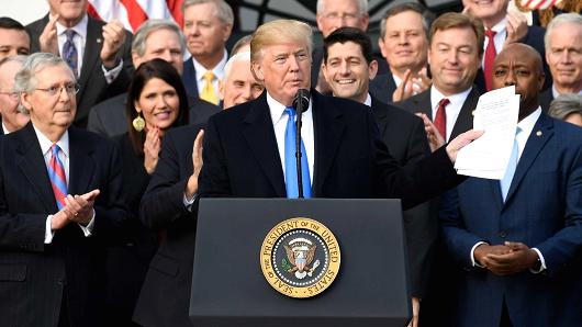 President Donald Trump speaks about the passage of tax reform legislation on the South Lawn of the White House in Washington, DC, December 20, 2017.