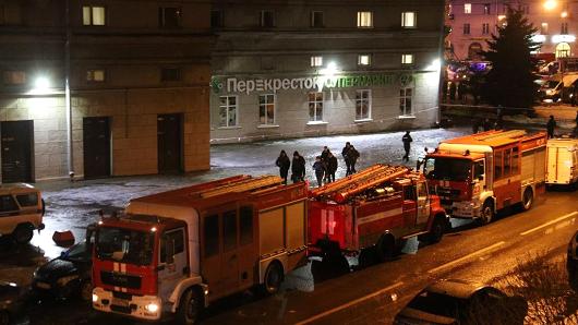 Security forces are seen outside the supermarket in Kalinina Square after an explosion in St. Petersburg, Russia on December 27, 2017. A total of nine people were injured after an explosion hit a store in St. Petersburg, Russia.