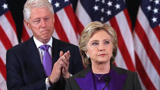 Former Secretary of State Hillary Clinton, accompanied by her husband former President Bill Clinton, concedes the presidential election at the New Yorker Hotel on November 9, 2016 in New York City.