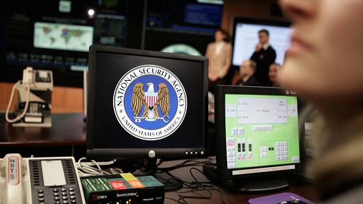 The National Security Agency (NSA) logo is shown on a computer screen inside the NSA in Fort Meade, Maryland.