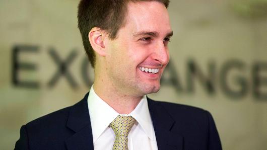 Snap Inc. CEO Evan Spiegel smiles before ringing the opening bell at the New York Stock Exchange as his company celebrates its IPO, Thursday, March 2, 2017.