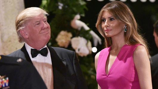 President Donald Trump and First Lady Melania Trump arrive for the 60th Annual Red Cross Gala at his Mar-a-Lago estate in Palm Beach on February 4, 2017.