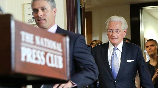Former Trump legal spokesman Mark Corallo (left) and President Donald Trump's personal attorney Marc Kasowitz arrive to the National Press Club in Washington to read a statement to members of the media, Thursday, June 8, 2017.