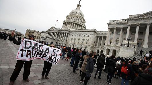 People protest in front of the U.S. Capitol to urge Congress to save the Deferred Action for Childhood Arrivals (DACA) program, on Dec. 6, 2017, in Washington, D.C.