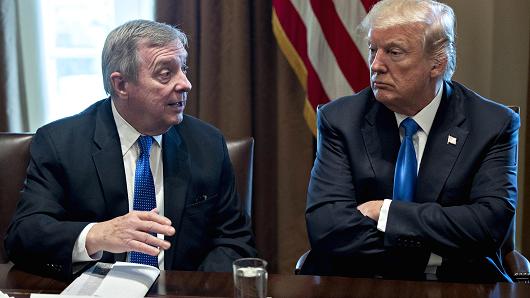 President Donald Trump, right, listens while Senator Dick Durbin, a Democrat from Illinois, speaks during a meeting with bipartisan members of Congress on immigration in the Cabinet Room of the White House in Washington, D.C., U.S., on Tuesday, Jan. 9, 2018.