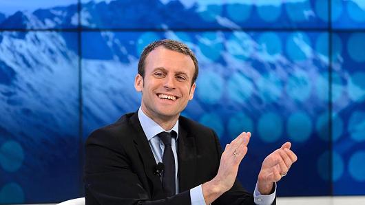 French President Emmanuel Macron gestures during a session at the World Economic Forum (WEF) annual meeting in Davos, 2016, when he was French finance minister.