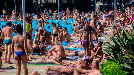 People at swimming pools in São Paulo, Brazil on a hot winter day last September.