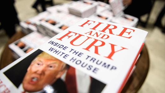Customers purchase copies of one of the first UK consignments of Michael Wolff's book on President Trump's Presidency 'Fire and Fury', at Waterstones, Piccadilly on January 9, 2018 in London, England.