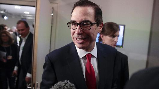 Steven Mnuchin, U.S. Treasury secretary, speaks to members of the media as he departs a press briefing on day three of the World Economic Forum (WEF) in Davos, Switzerland, on Thursday, Jan. 25, 2018.