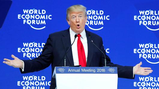 President Donald Trump gestures as he delivers a speech during the World Economic Forum (WEF) annual meeting in Davos, Switzerland January 26, 2018.
