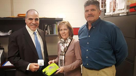 From left to right: Joseph Occhino, the principal of Northern Highlands Regional High School in Allendale, New Jersey, with school nurse Anne Rutkowski and supervisor of health and wellness Steve Simonetti. All have been trained to administer the lifesaving drug Narcan in case of an overdose on school grounds.