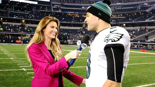 Fox sideline reporter Erin Andrews interviews Philadelphia Eagles quarterback Mark Sanchez (3) after the game between the Dallas Cowboys and the Philadelphia Eagles at AT&T Stadium in Arlington, Texas.
