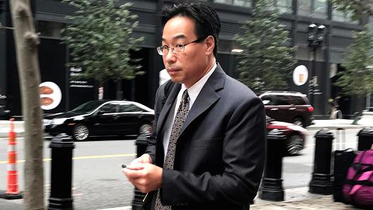 Former New England Compounding Center supervisory pharmacist Glenn Chin enters the federal court in Boston, Massachusetts, September 19, 2017.