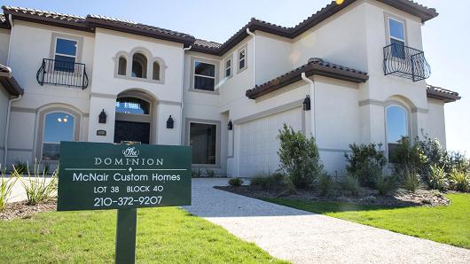 A new home for sale stands in the Andalucia neighborhood of The Dominion gated community in San Antonio, Texas.