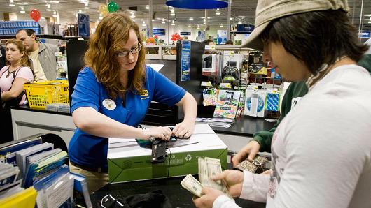 A shopper makes a purchase at a Best Buy store in Corpus Christi, Texas.