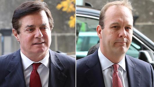 Paul Manafort and Richard Gates arrive at the Prettyman Federal Courthouse for a bail hearing November 6, 2017 in Washington, DC.