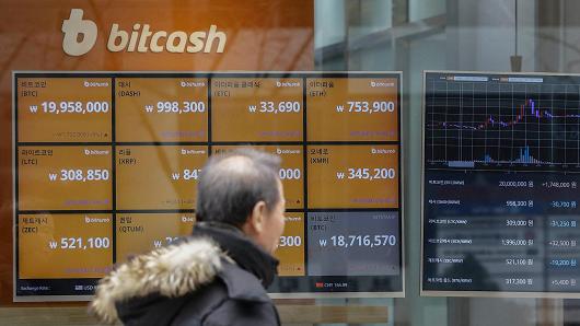 A Screen shows the prices of bitcoin at a virtual currency exchange store in Seoul, South Korea.