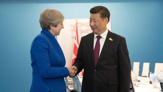 British Prime Minister Theresa May with Chinese President Xi Jinping at a bilateral meeting during the G20 summit on July 7, 2017.