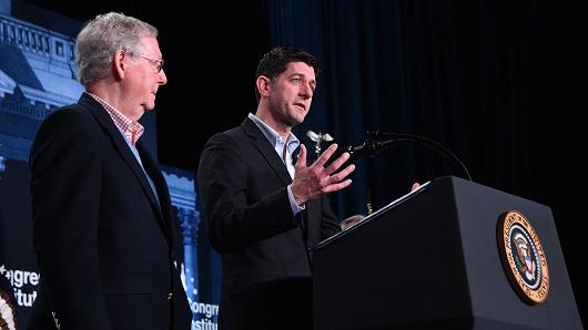 House Speaker Paul Ryan (R) and Senate majority leader Mitch McConnell (L) deliver a speech in White Sulphur Springs, West Viriginia during the Republican party retreat on February 01, 20108.