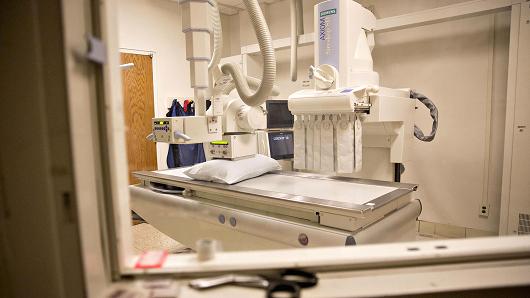 An x-ray machine sits in an exam room at Perry Memorial Hospital in Princeton, Illinois.