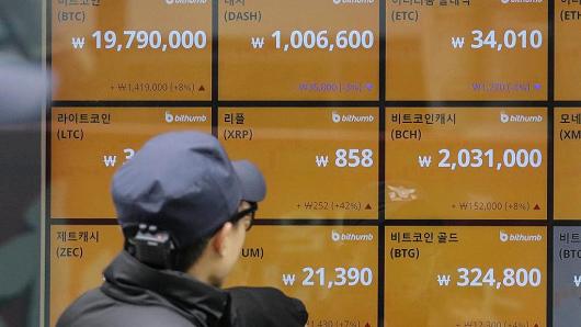 A screen showing prices of bitcoin at a Cryptocurrency exchange store in Seoul on December 15, 2017.