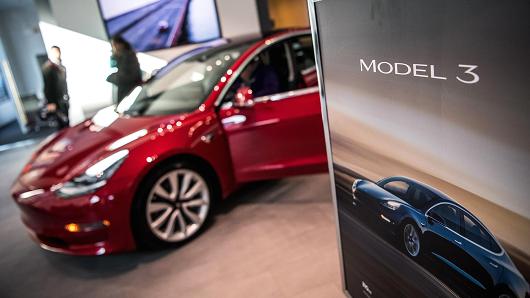 Tesla's new Model 3 car on display is seen on Friday, January 26, 2018, at the Tesla store in Washington, D.C.