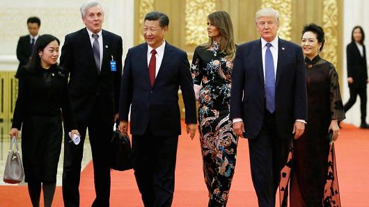 The military aide carrying the nuclear football (second from left) with U.S. President Donald Trump and China's President Xi Jinping at Beijing's Great Hall of the People.