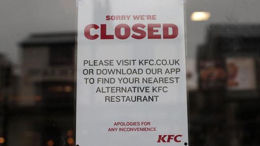 A closed sign on the door of a KFC restaurant in Clapham, south London, as the fast food outlet has been forced to close a raft of stores after a new delivery contract with DHL resulted in chicken shortages across the country.