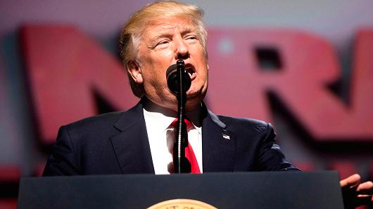 President Donald Trump arrives to address the National Rifle Association (NRA) Leadership Forum in Atlanta, Georgia on April 28, 2017.